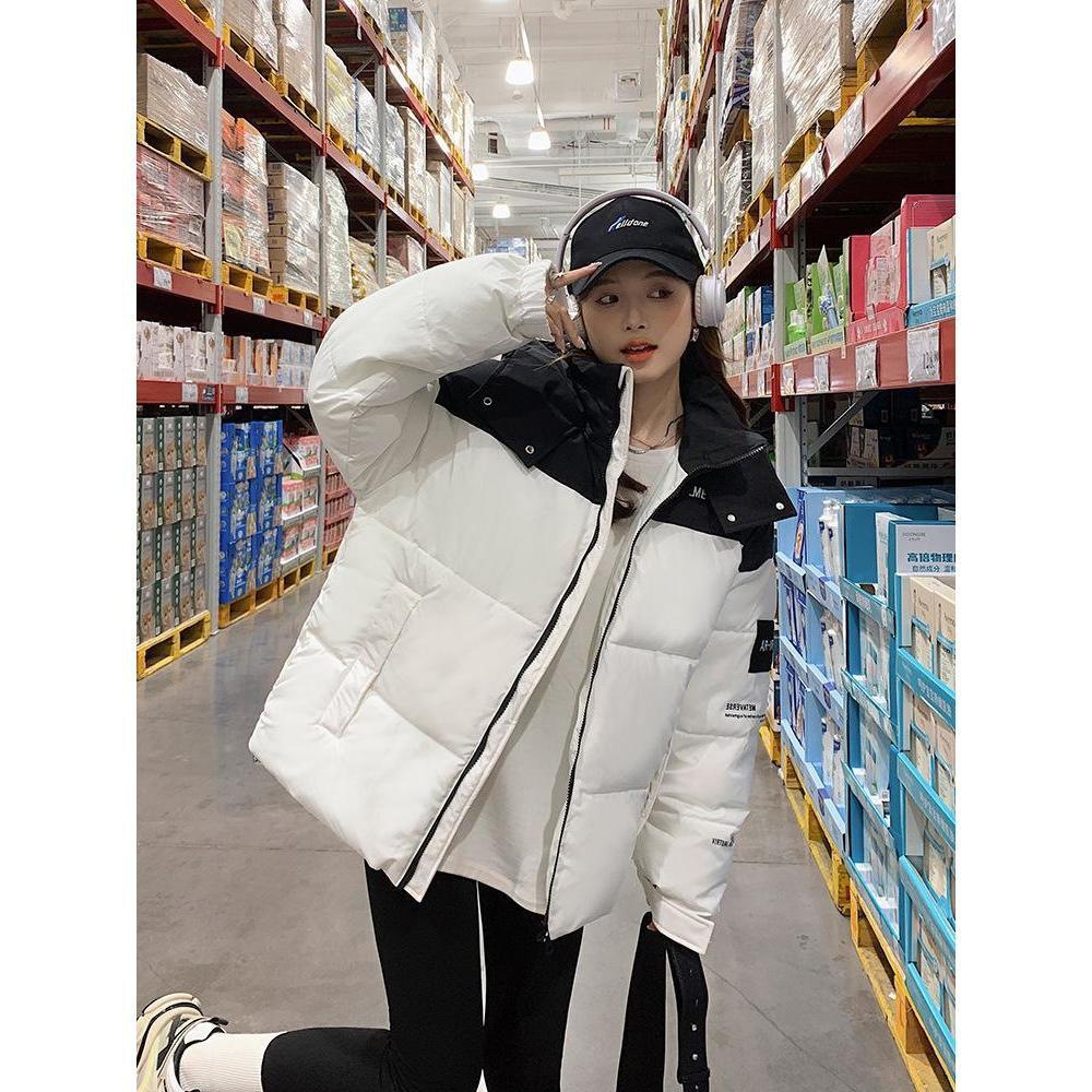 Comercio exterior invierno de 2025 nueva ropa de algodón de color grueso con sombrero de mujer ropa de algodón suelta ropa de pan chaqueta de algodón