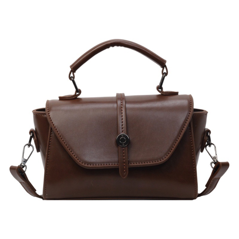 Bolso de moda de gama alta para mujeres 2024 nuevo portátil todo partido retro pequeño bolso cuadrado nicho diseño bolso de hombro