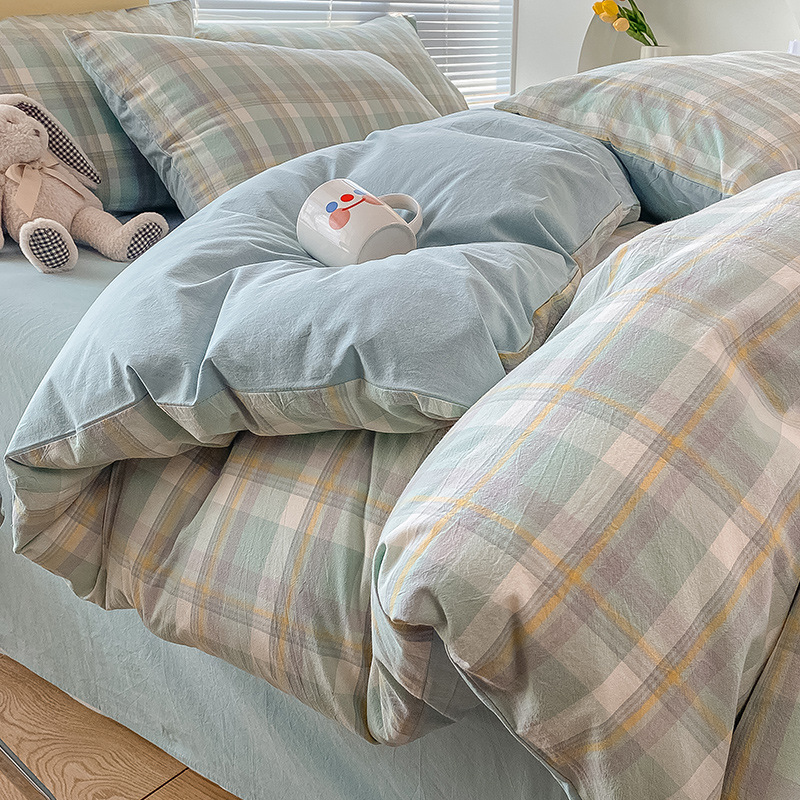 Cama de algodón lavado de algodón de cuatro piezas funda de edredón de sábanas de algodón 2025 nuevo juego de tres piezas de dormitorio de ropa de cama