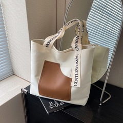 簡約韓版帆布單肩包包女2024新款字母肩帶手提包大容量通勤托特包