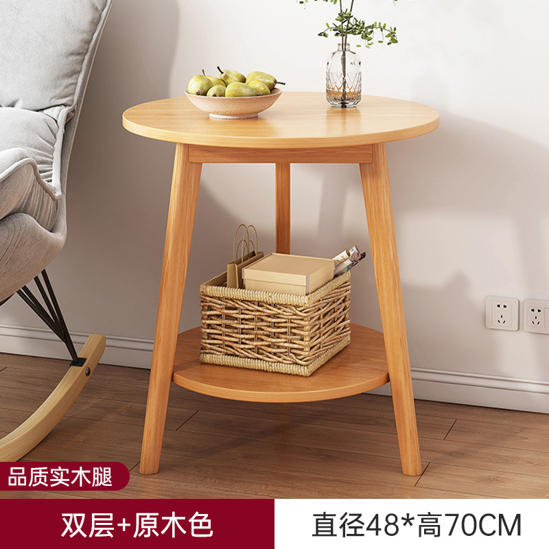 Sofá de la sala de estar pequeña mesa redonda doméstica, estante de cabecera de cama moderno y minimalista, mesa de té creativa con balcón
