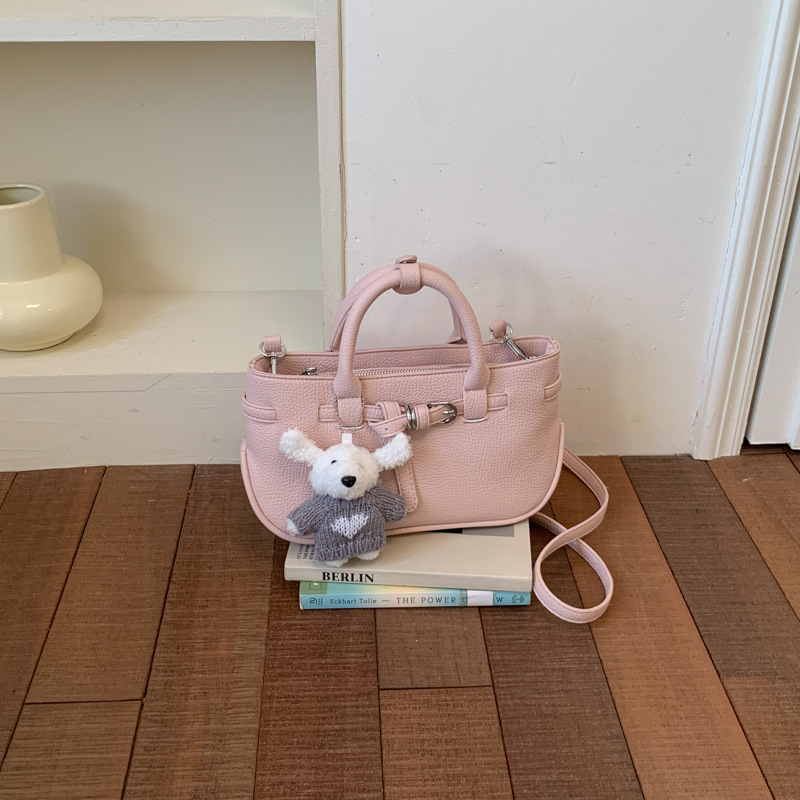 Bolso francés de estilo occidental para mujeres 2026 verano nuevo nicho diario temperamento litchi mochila de hombro