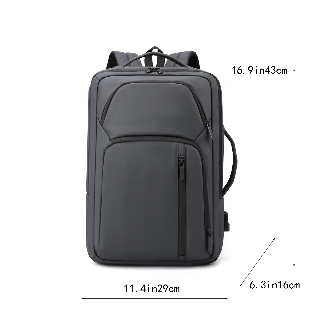 Nueva película de cuero mochila a prueba de derrames USB recargable de gran capacidad mochila de viaje de moda simple bolso de computadora para hombres