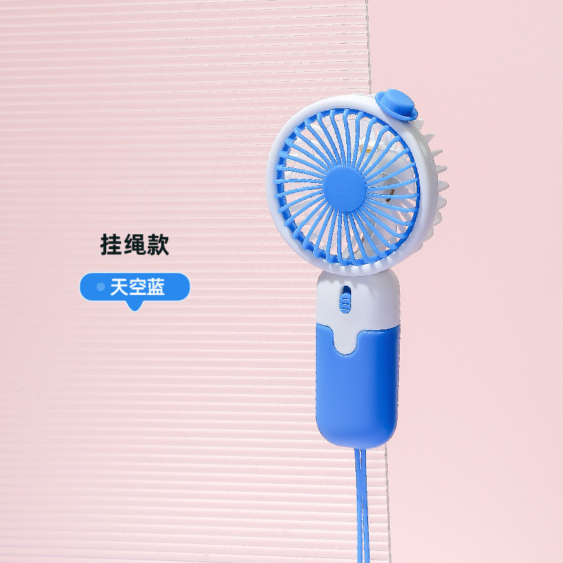 Venta al por mayor mudo gran viento plegable ventilador de mano niños portátil mini ventilador N ° 5 batería regalo LOGO