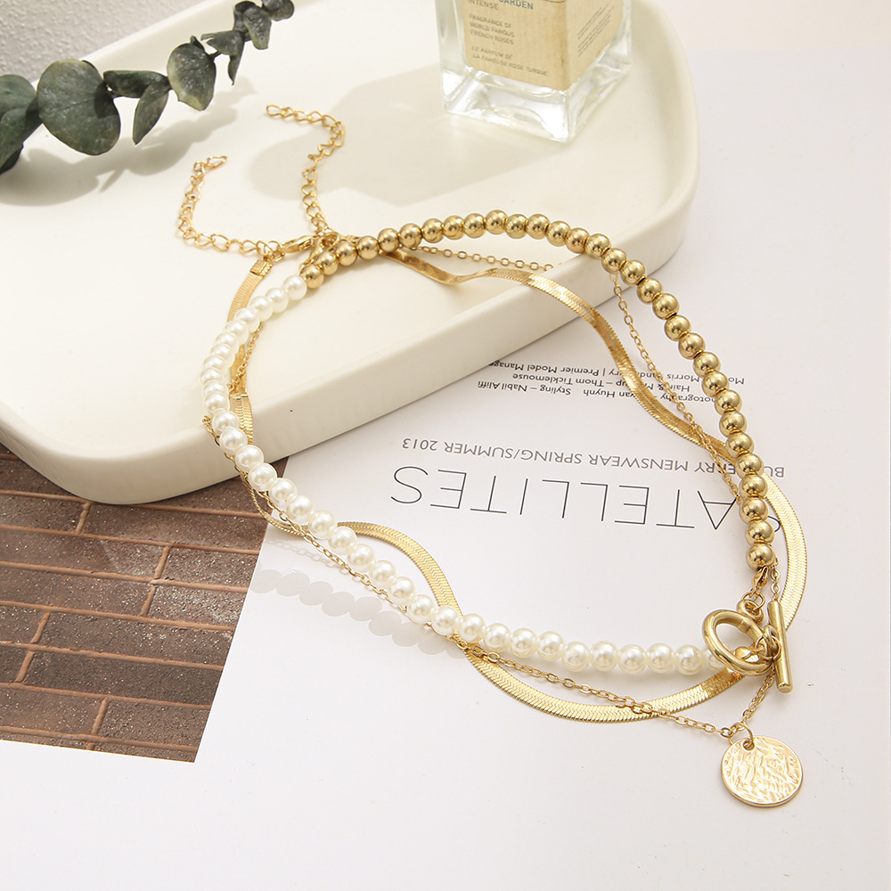 2021 Nuovo ciondolo alla moda con moneta multistrato e catena a serpente intrecciata, collana di perle, set da 3 pezzi per donna_voghion.com