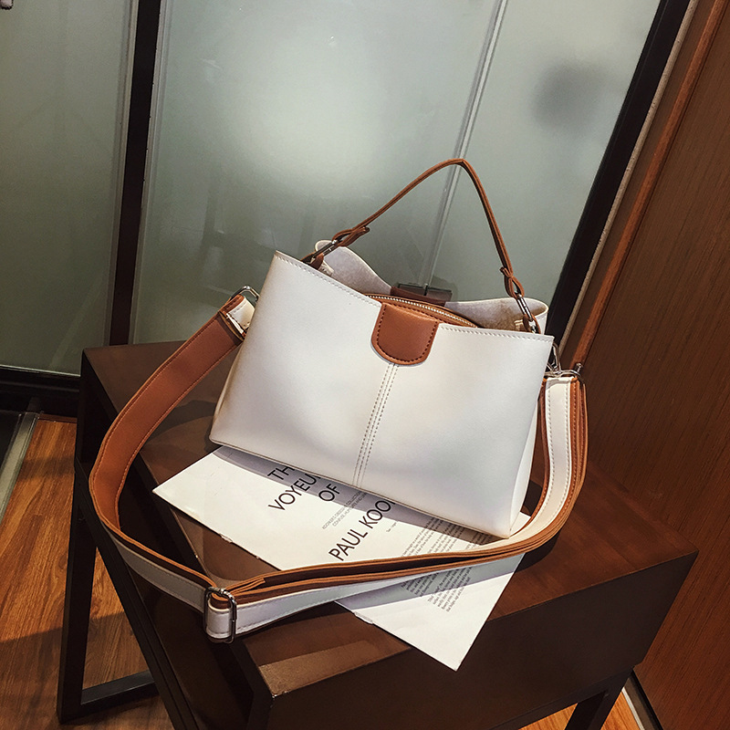 Bolso de cubo de boutique de alta gama para mujer 2023 nuevo bolso de mano a juego de color coreano bolso de mensajero simple y versátil para mujer