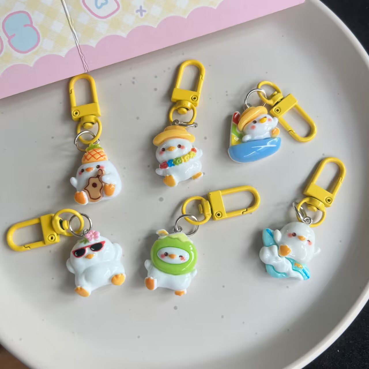 Lindo vacaciones pato llavero animal chica corazón dulce estudiante de dibujos animados bolsa de la cadena colgante adornos joyería