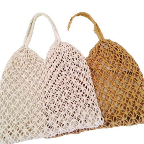 Manufacturer wholesale straw bag. New holiday cotton rope bag handwoven women's bag hollow mesh unlined single