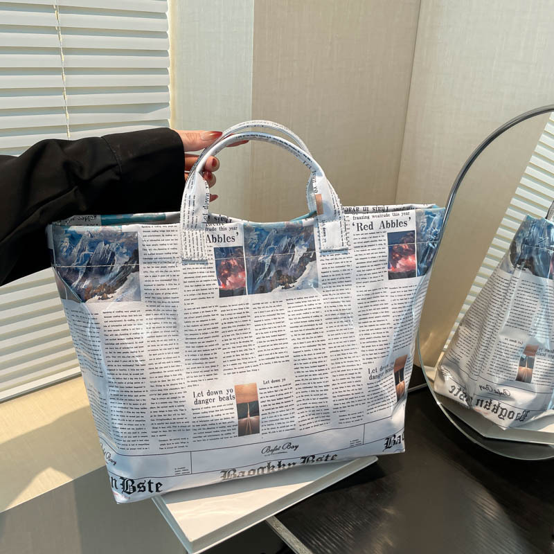 2026 Large Capacity Newspaper Print Bag New Korean Style Fashion Trend Women's Casual Handheld Tote Bag Women's Bag 2026 Large Capacity Newspaper Print Bag New Korean Style Fashion Trend Women's Casual Handheld Tote Bag Women's Bag