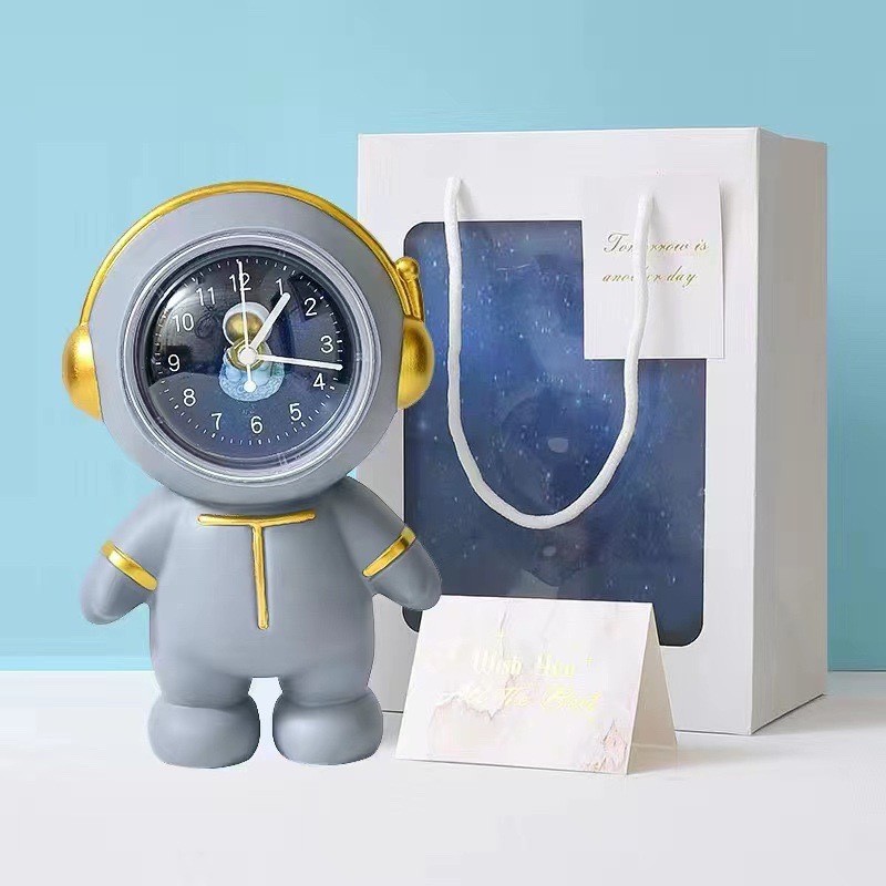 Reloj creativo astronauta alcancía puede guardar astronautas alcancía decoración del hogar Regalo de Cumpleaños de los niños