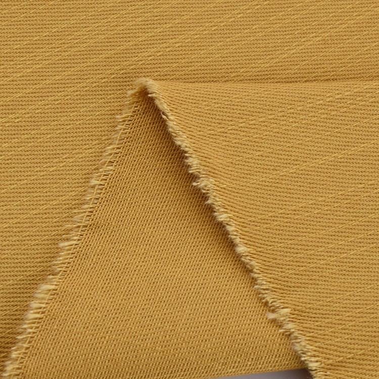 Fabricante al por mayor 100% tejido de algodón orgánico de color sólido pantalones de ropa
