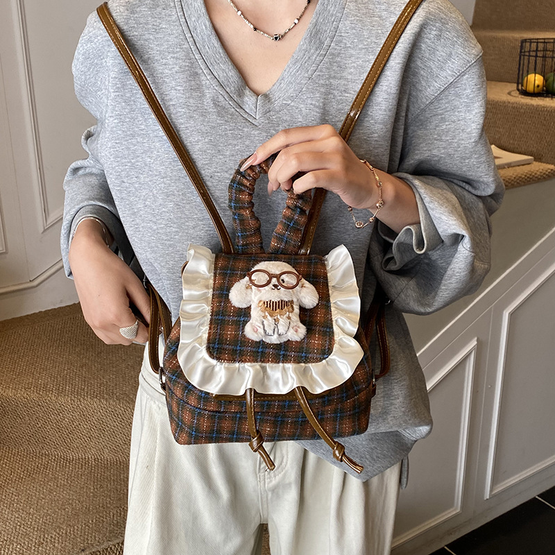 Otoño y invierno nueva mochila infantil coreana encaje mochila a cuadrícula para niños y niñas mochilas de dibujos animados cachorros mochilas de bebés