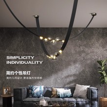 极简皮带餐厅吊灯现代简约意大利设计师样创意露珠造型复式楼灯具
