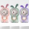 Small cartoon handheld air fan, table night light