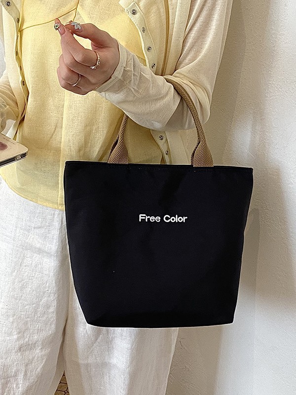 Nicho de diseño nuevo bolso de nylon de color sólido portátil de gran capacidad simple ocio versátil bolso de compras de viaje diario