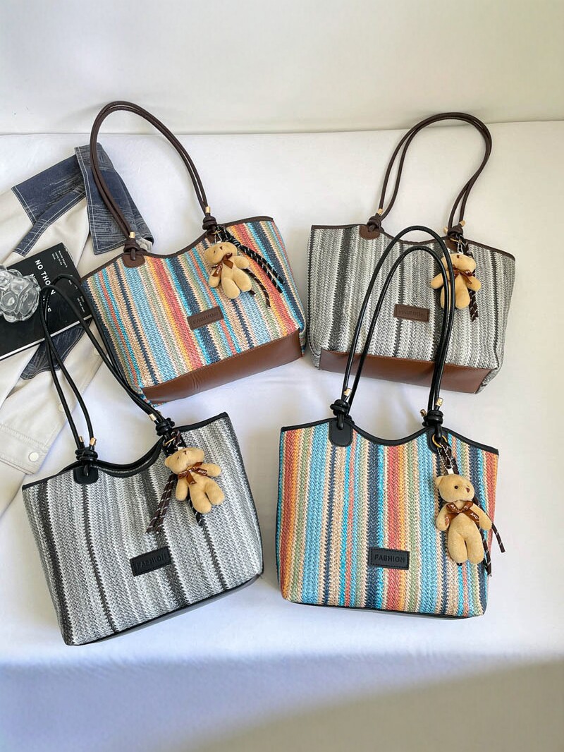 2026 nueva bolsa de tejido para mujeres de gran capacidad de viaje bolso de hombro portátil a rayas de moda bolso de mochila