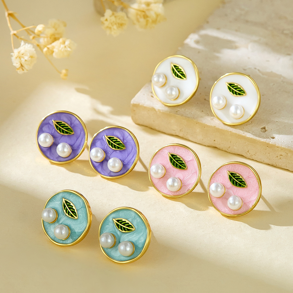 Pendientes de diseño de hojas de aceite de goteo redondo de estilo de pintura al óleo retro de alta gama Pendientes de perlas de temperamento de nicho francés