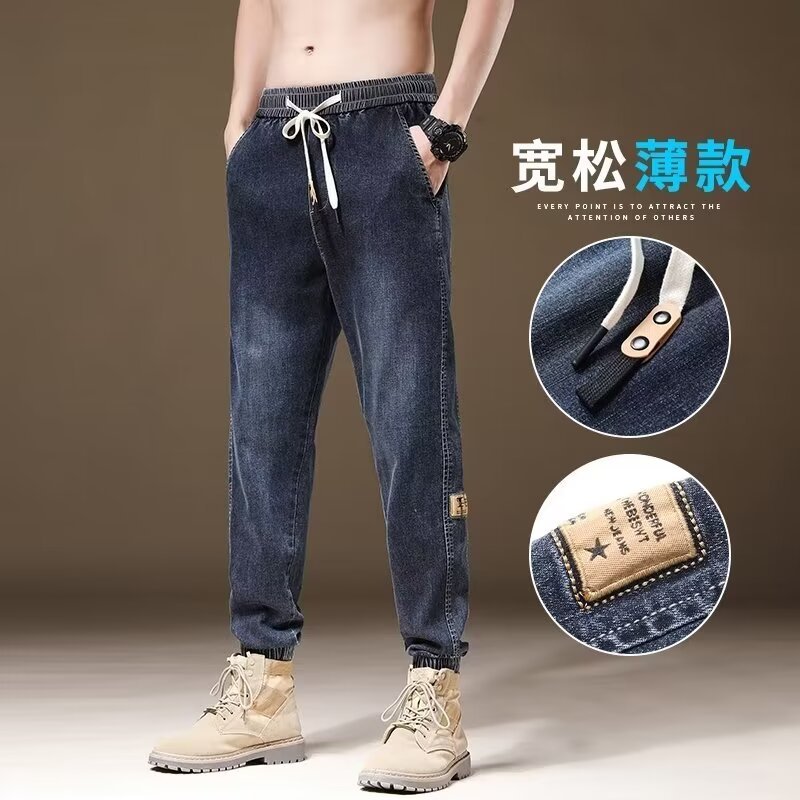 2024 primavera y otoño pantalones vaqueros de cintura elástica todo fósforo para hombres, pantalones de pierna ancha rectos sueltos para adolescentes de la calle principal