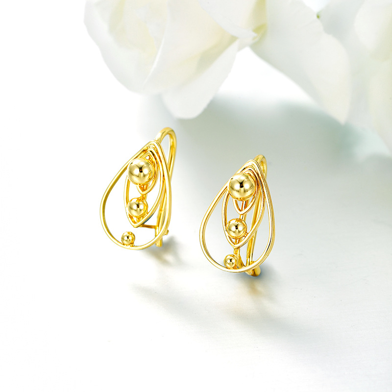 Xuping aleación de cobre 14k nicho de diseño de personalidad transfronteriza aretes de viento colgante conjunto de joyas mujeres image 4