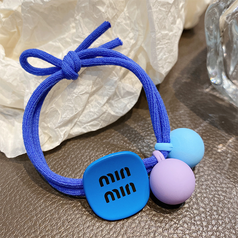Coreano simple letra MIN anillo de cabello de niña bola cabeza cuerda de cola de caballo universal toque de cabello correa de cuero al por mayor