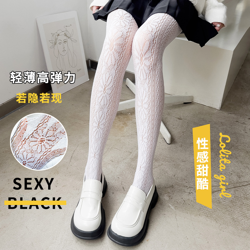 Calcetines de fondo fino de verano de las mujeres hueco red de pesca crisantemo ins moda dulce blanco y negro adelgazamiento todo partido pantimedias fabricantes lote