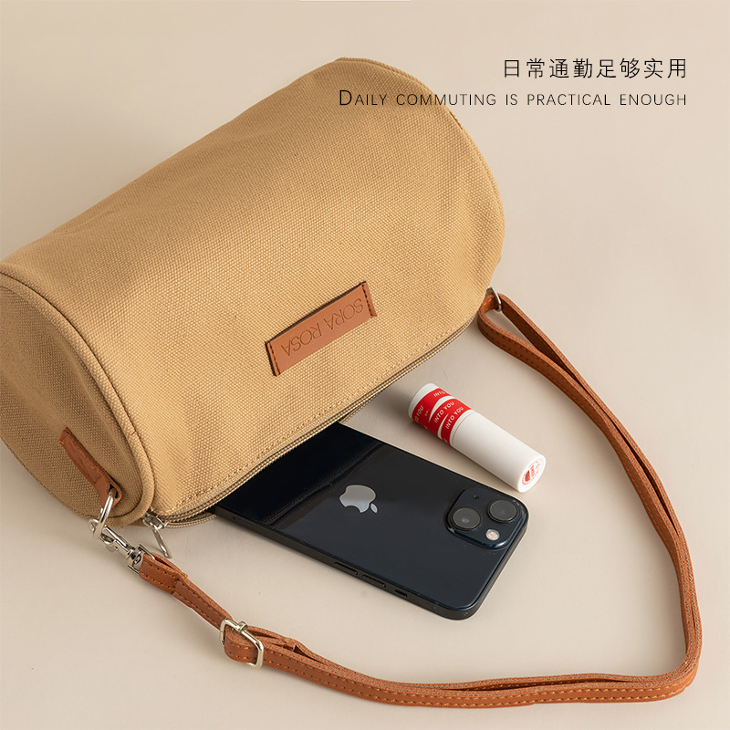 卡其色圆筒包_08