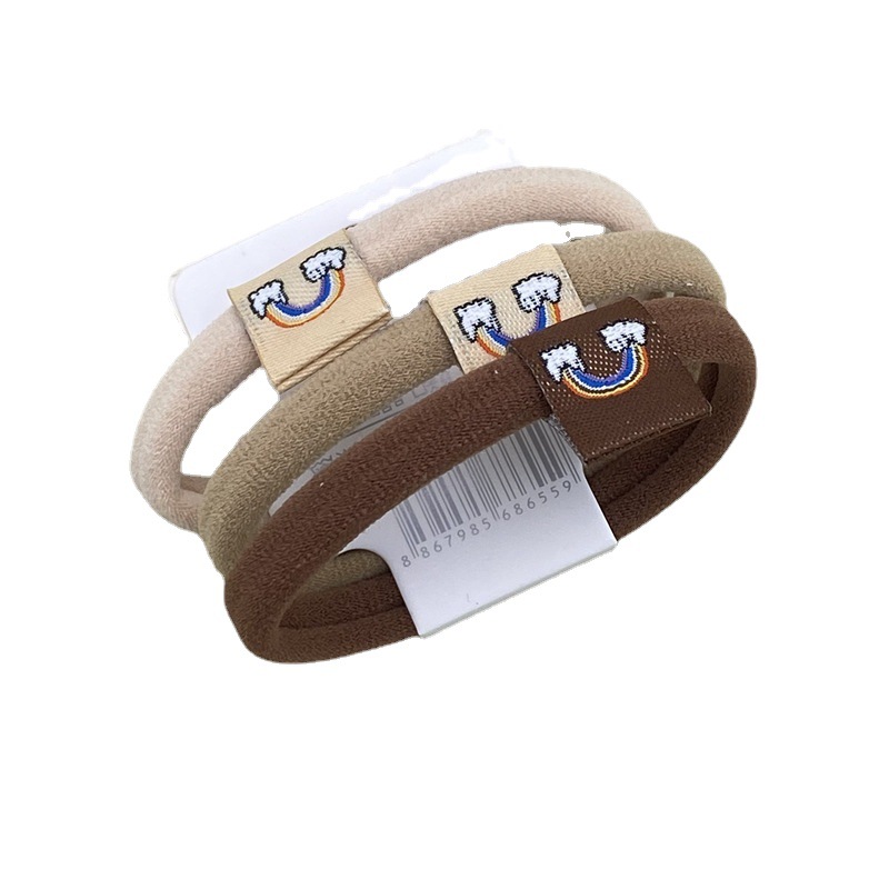 2022 nuevo estilo coreano accesorios para el cabello leche té color Banda para el cabello sin costuras etiqueta de tela Linda cuerda para el cabello 3 tarjetas cabeza cuerda banda de goma