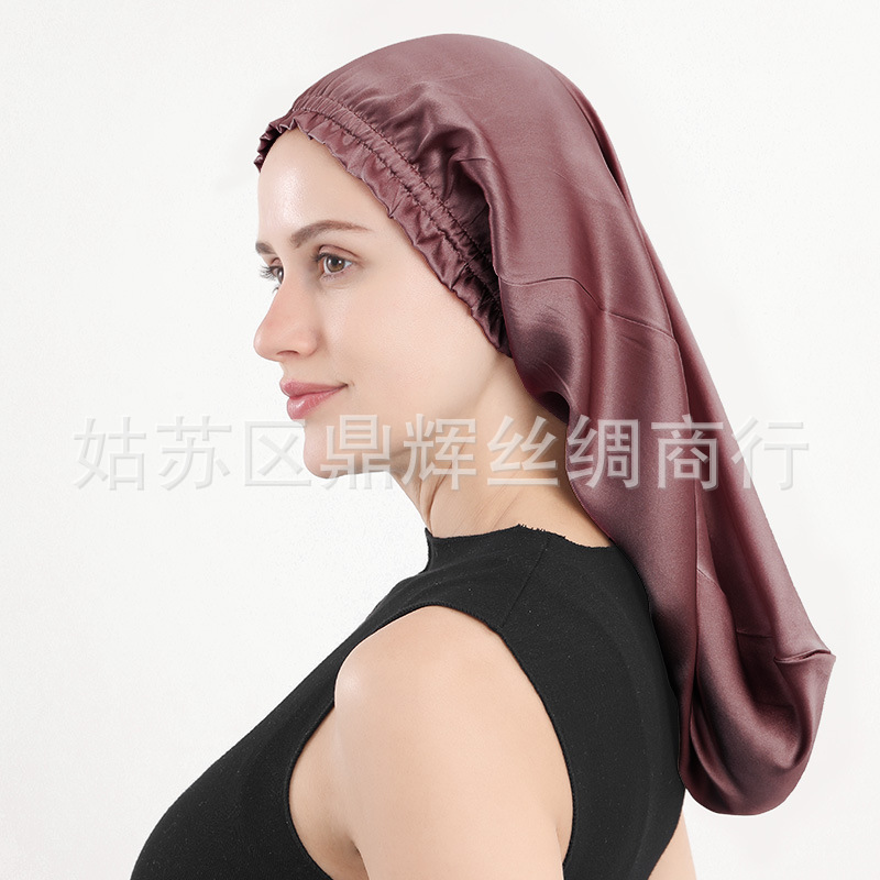 新商品のシルクの寝帽の桑のシルクの長髪の帽子の木の耳元の長い筒の帽子の女性の家庭のヘアケアの帽子のアマゾン