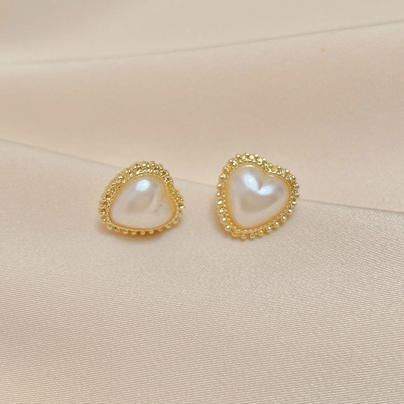 Pendientes de perlas, pendientes de estilo caliente, lujo ligero, pendientes simples de celebridades de Internet, accesorios de Yiwu, venta al por mayor