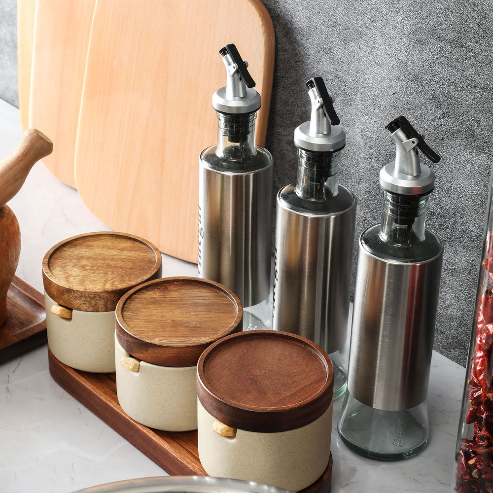 Decoración de gabinete de cocina modelo simple combinación de ollas de acero inoxidable tazas de ollas condimento frasco floral exhibición