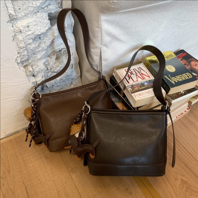 Coreano suave retro bolso de balde para mujeres 2025 invierno nueva moda simple bolso de hombro bolso de viaje