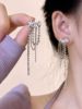 Asymmetrical earrings with tassels, diamond encrusted, simple and elegant design, light luxury style