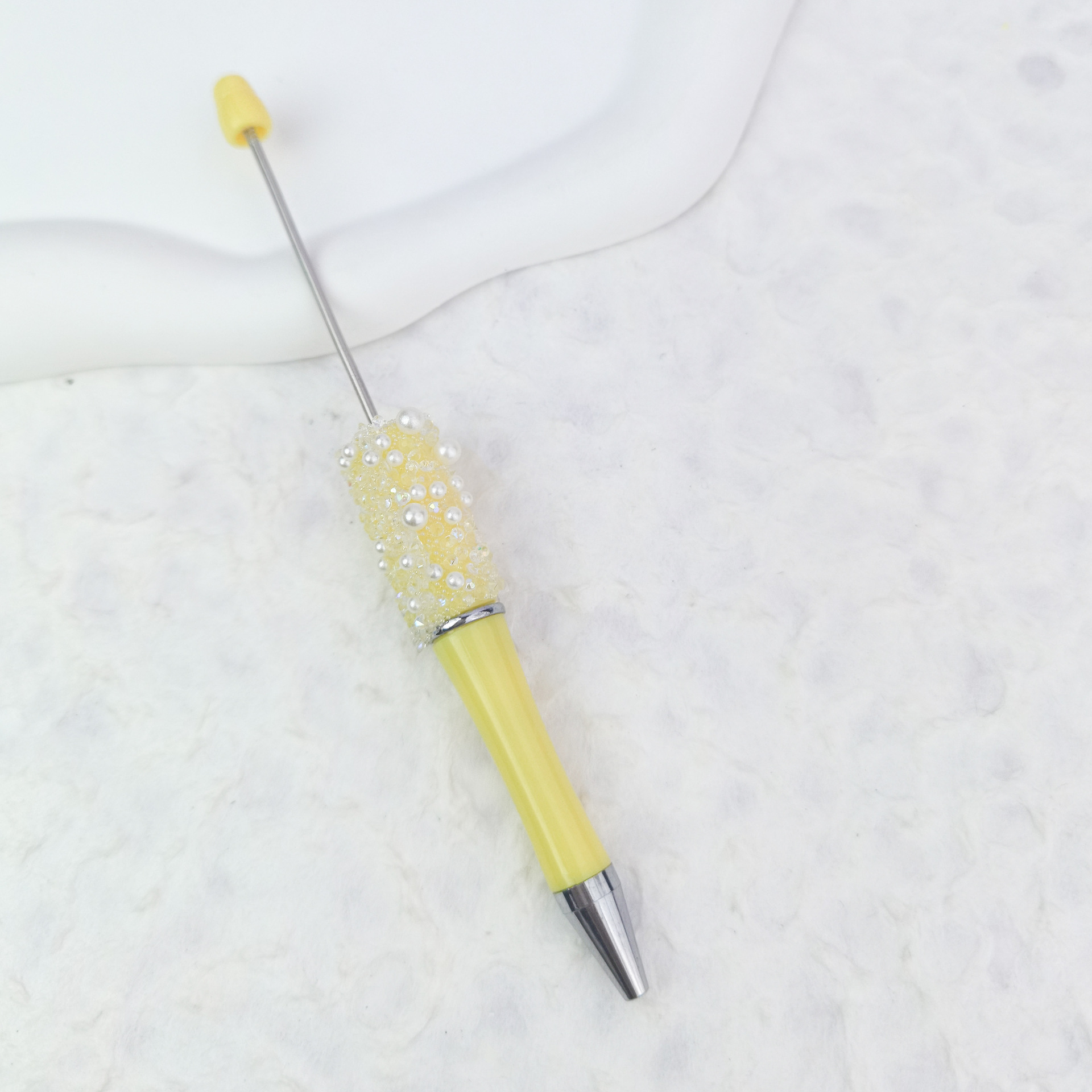 78. Macaron light yellow (sugar pearl style)