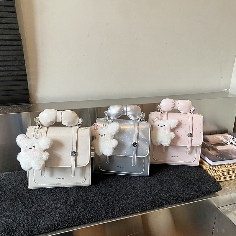 Dulce pequeña mochila fresca para niños y niñas, lindas mochilas de arco para bebés, mochilas de mano coreanas nuevas mochilas para niños