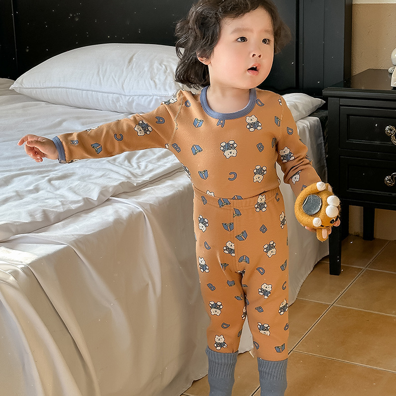 Ropa de otoño del bebé pantalones largos traje algodón los niños invierno cepillado estilo Coreano ropa interior térmica lana estante sin hueso Pijamas