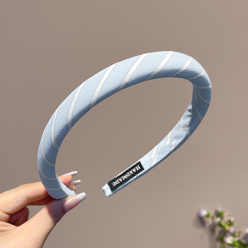 Pequeño aro de cabello azul fresco para mujeres primavera y verano estilo de cabello temperamento lavado de cara aro de cabello alto cráneo antideslizante presión tarjeta de cabello