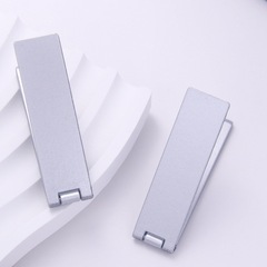 金属一字長条折り畳み携帯電話スタンド軽薄背貼り式スタンド多機能折り畳みデスクトップ横縦スタンド