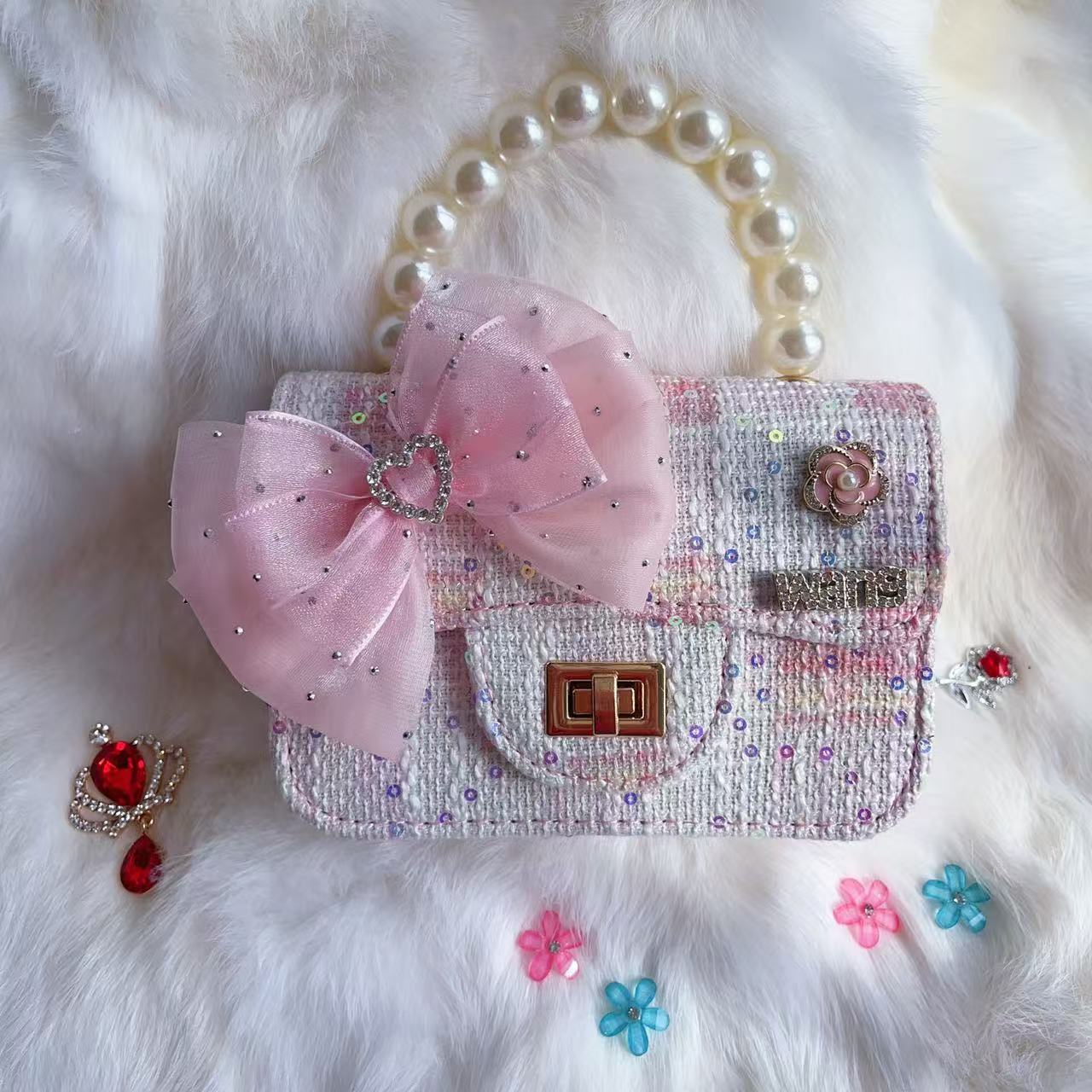 Nuevo tipo de bolsos para niños, bolsos de moda, bolsos de princesa de viento, bolsos portátiles lindos para chicas, bolsos de red para bebés.