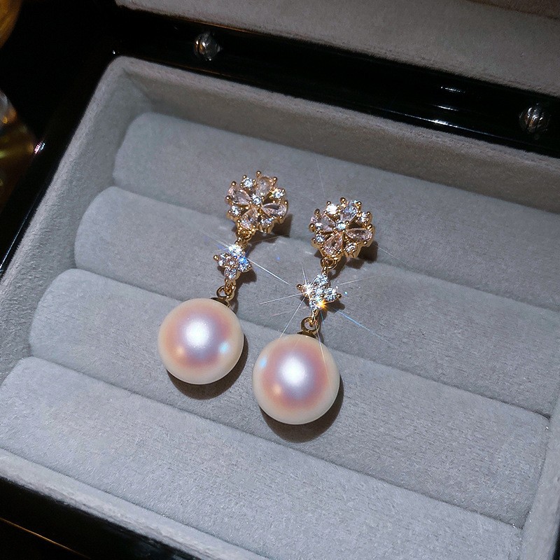 Aguja de plata, circón, copo de nieve, borla, pendientes de perlas, pendientes de todo fósforo de nicho femenino, pendientes de temperamento de moda, lujo ligero, sentido de alta gama