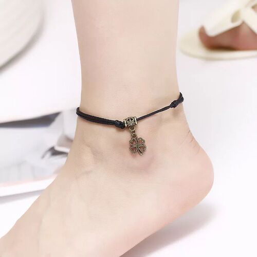Handmade black ankle chain with simple red rope, designed for students, featuring a bell and agate, vintage ankle chain accessory for the Year of the Monkey.