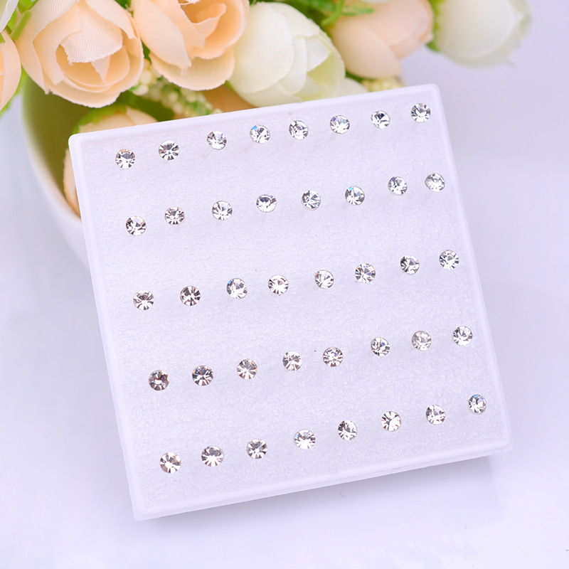 Pendientes de resina, pendientes de plástico, juego de joyería para oreja de mujer, aretes de hueso de la oreja, aretes pequeños en caja, aretes de hueso de la oreja PDD al por mayor