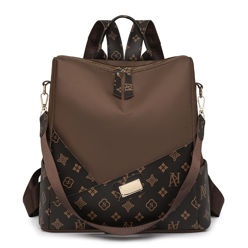 Comercio exterior al por mayor 2024 nueva moda europea y americana señoras mochila de nailon impresión color de contraste mochila de viaje de un solo hombro marea