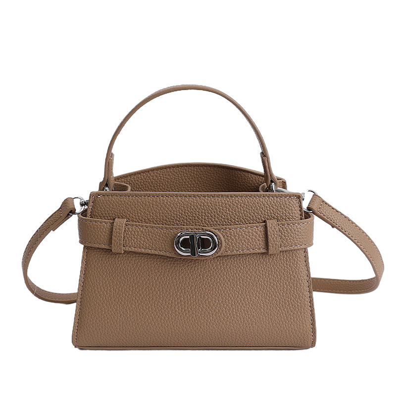 Textura de alta calidad nicho bolso de mano pequeño bolso de mujer nuevo ligeramente lujoso estampado lichi bolso Kylie bolso de mochila de estilo exterior