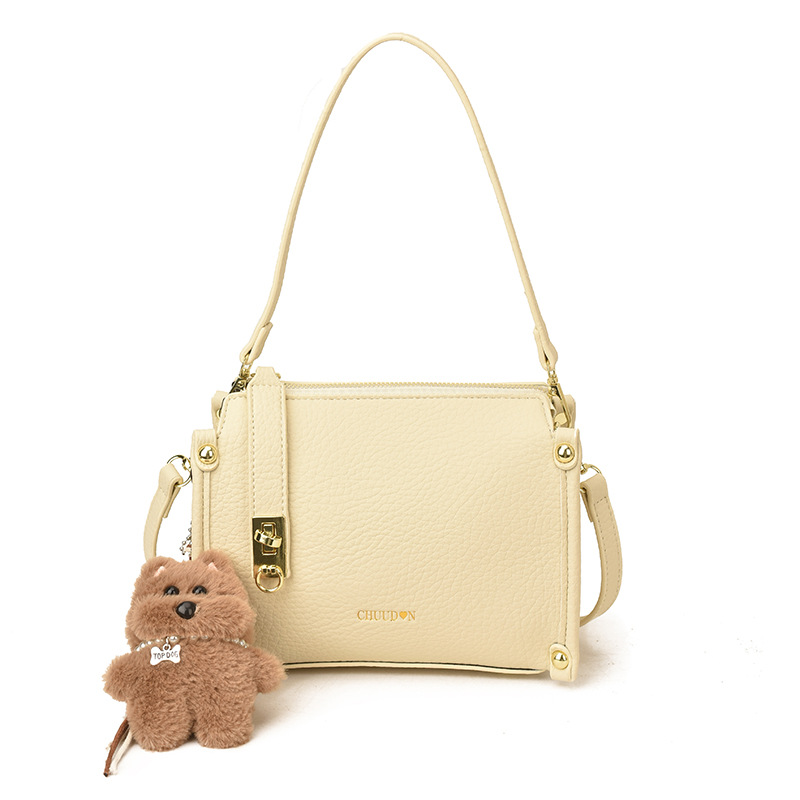 Bolsos retro retro de alta calidad para mujeres 2026 nueva textura lichi bolso pequeño estilo coreano simple mochila de hombro