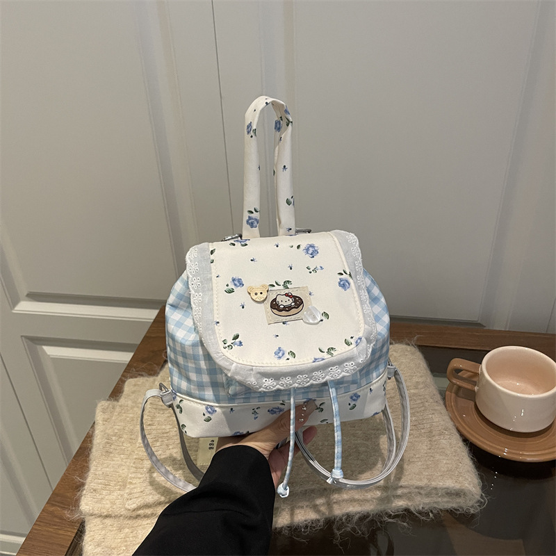Japón dulce puro deseo mochila de encaje 2025 nueva chica coreana encantadora viaje flor pegatinas mochila pequeña