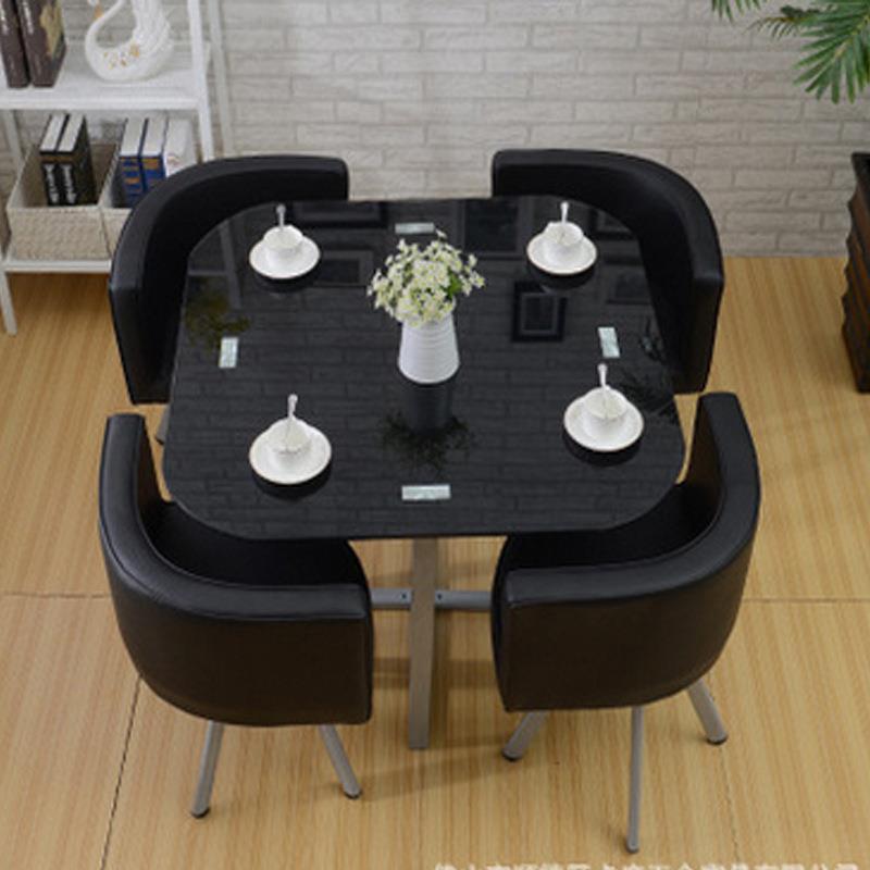 Mesa y sillas de comedor modernas, mesa redonda pequeña de vidrio templado, mesa y sillas para recepción y negociación, una mesa y cuatro sillas, cocina de inducción.