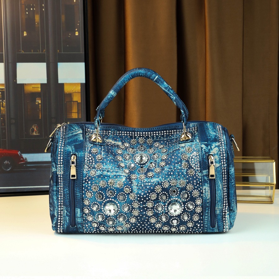 Nuevo bolso de mujer portátil 2025 bolso de mensajero de tendencia transfronteriza con tachuelas de diamantes bolso de hombro de mezclilla casual