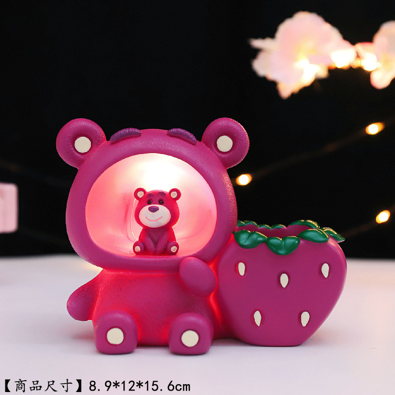 Strawberry, purple coloured pencils, pens holder, ceiling light