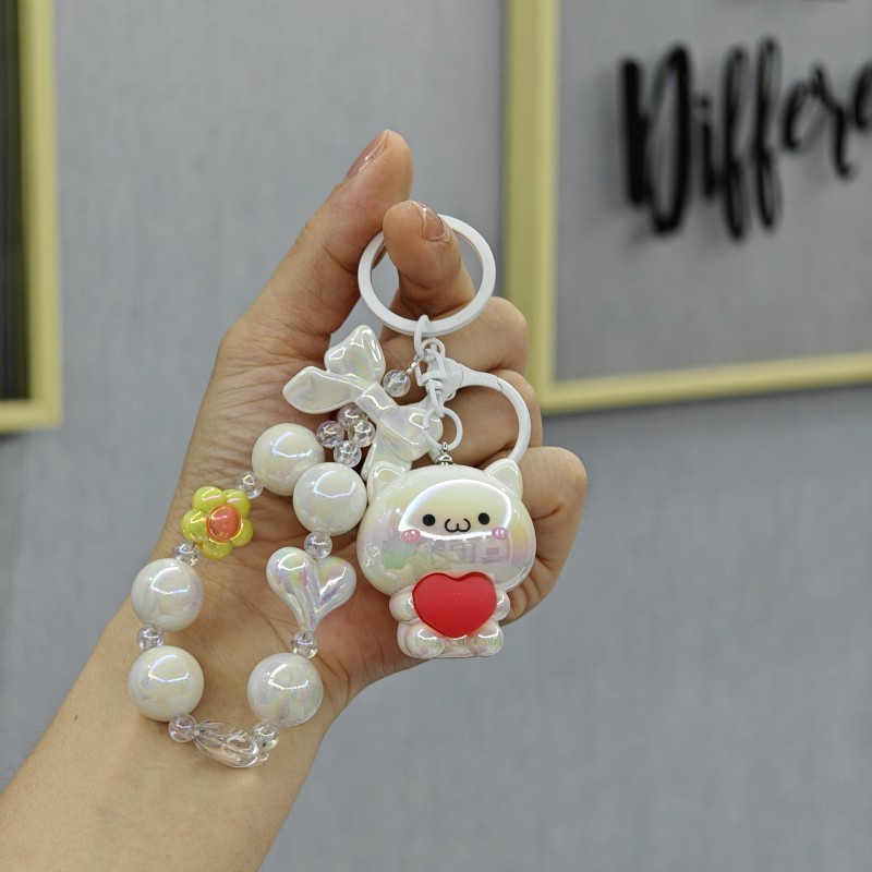 Galvanoplastia abrazo amor oso con cuentas llavero colgante acrílico muñeca colgante garra máquina muñeca regalo al por mayor