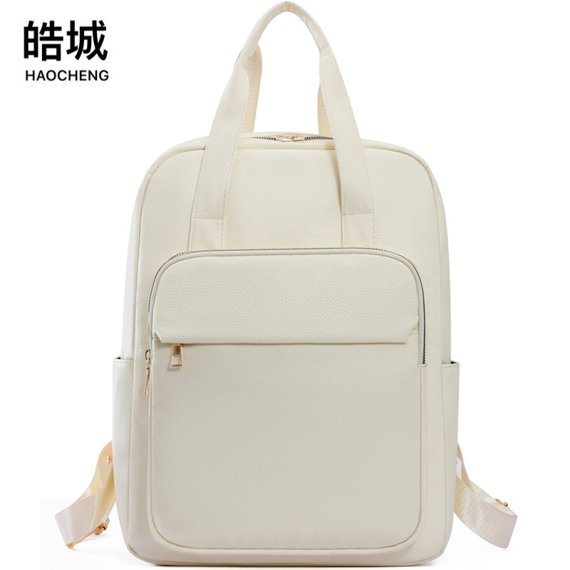 Mochila de computadora de cuero suave de 15 pulgadas al por mayor transfronteriza 2024 nueva mochila portátil de embarque de viaje de negocios de gran capacidad